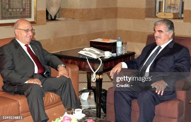 Lebanese Prime Minister Rafiq al-Hariri meets with Palestinian Foreign Minister Nabil Shaath 13 August 2003 in Beirut. The United Nations expressed...