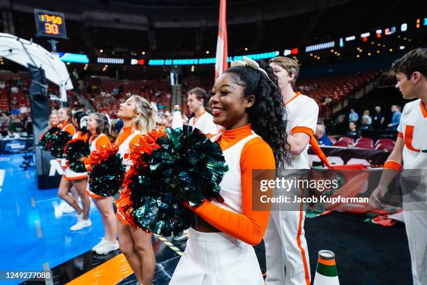 Miami Hurricanes cheerleader during the Sweet Sixteen round of the 2023 NCAA Womens Basketball Tournament held at Bon Secours Wellness Arena on March...