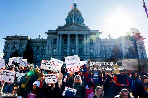 People march around the Colorado State Capitol during a protest to end gun violence in schools on March 24, 2023 in Denver, Colorado. The protest...