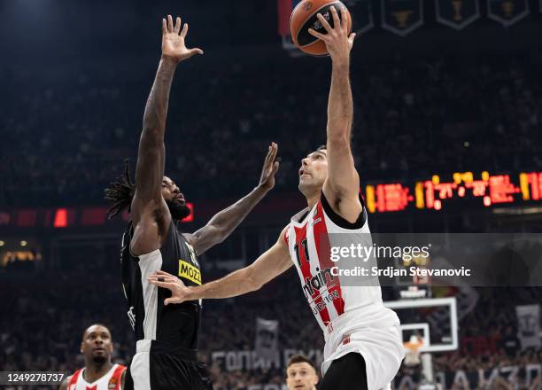 Kostas Sloukas of Olympiacos in action against Mathias Lessort of Partizan during the 2022-23 Turkish Airlines EuroLeague Regular Season Round 30...