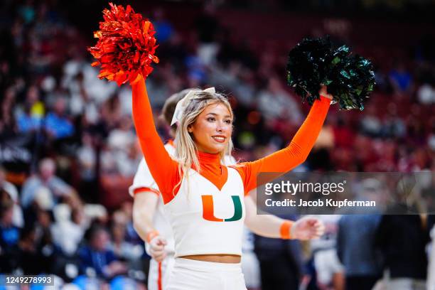 Miami Hurricane cheerleader during the Sweet Sixteen round of the 2023 NCAA Womens Basketball Tournament held at Bon Secours Wellness Arena on March...