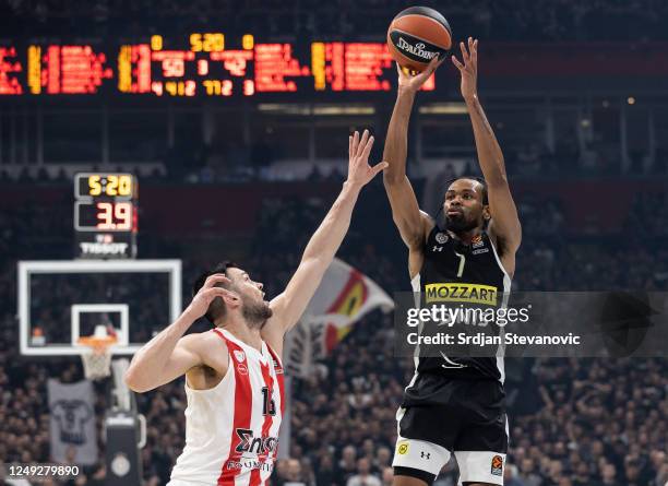 Kevin Punter of Partizan in action against Kostas Papanikolau of Olympiacos during the 2022-23 Turkish Airlines EuroLeague Regular Season Round 30...