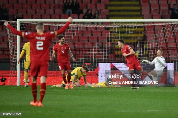 Serbia's forward Dusan Vlahovic scores his team second goal during the UEFA Euro 2024 Group G qualification match between Serbia and Lithuania, at...