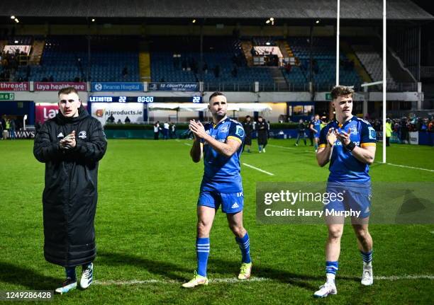 Dublin , Ireland - 24 March 2023; Leinster players, from left, John McKee, Dave Kearney and Rob Russell after the United Rugby Championship match...