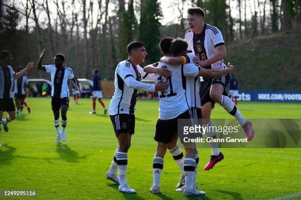 Dzenan Pejcinovic jumps over Ibrahim Maza as a celebration after the 2nd goal of the game during the international friendly match between France U18...