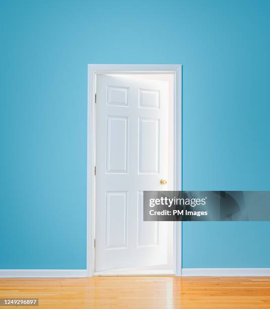 mysterious door - glowing doorway stock pictures, royalty-free photos & images