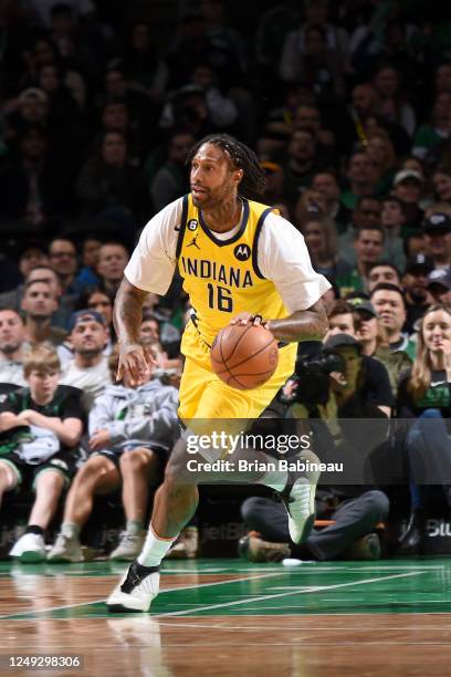 James Johnson of the Indiana Pacers dribbles the ball during the game against the Boston Celtics on March 24, 2023 at the TD Garden in Boston,...