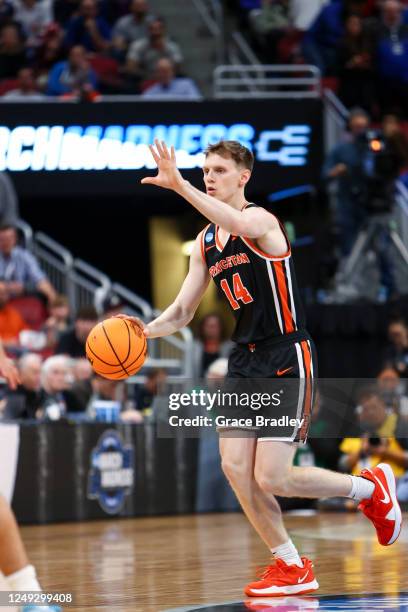 Matt Allocco of the Princeton Tigers dribbles the ball up the court against the Creighton Bluejays during the Sweet Sixteen round of the 2022 NCAA...