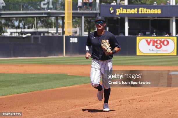 New York Yankees infielder Anthony Volpe trots off the field during the spring training game between the Minnesota Twins and the New York Yankees on...