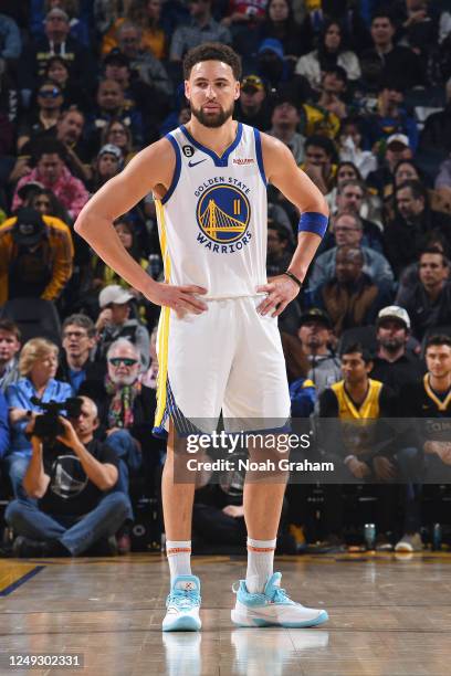 Klay Thompson of the Golden State Warriors looks on during the game against the Philadelphia 76ers on March 24, 2023 at Chase Center in San...