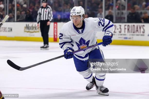 Toronto Marlies right wing Max Ellis plays the puck during the first period of the American Hockey League game between the Toronto Marlies and...