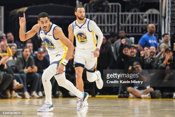 Jordan Poole of the Golden State Warriors celebrates a basket in the first quarter against the Philadelphia 76ers at Chase Center on March 24, 2023...