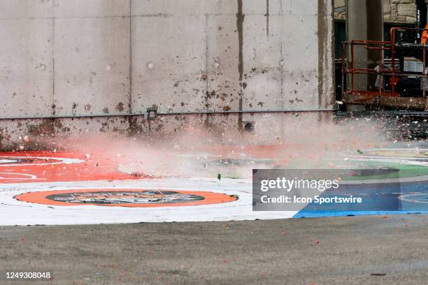 Watermelons explode after Ross Chastain drops them from the Observation Tower at the NASCAR Cup Series EchoPark Automotive Grand Prix on March 24,...