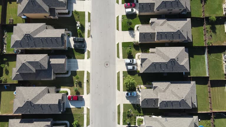 https://media.gettyimages.com/id/1249327742/video/straight-down-in-the-middle-of-two-sides-of-the-neighborhood.jpg?b=1&s=640x640&k=20&c=NVeTvIFK5HttO4c8_UnjVeRrWt7Tvx8Nqe_4JXl6hP8=