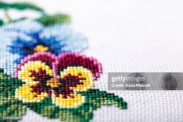 embroidered good by cross stitch pattern - cross stitch stock pictures, royalty-free photos & images