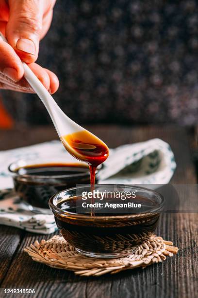 natural locust molasses - molasses stock pictures, royalty-free photos & images