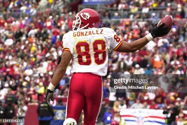 Tony Gonzalez of the Kansas City Chiefs celebrates a touchdown during a NFL football game against the Washington Redskins on September 28, 2001 at...