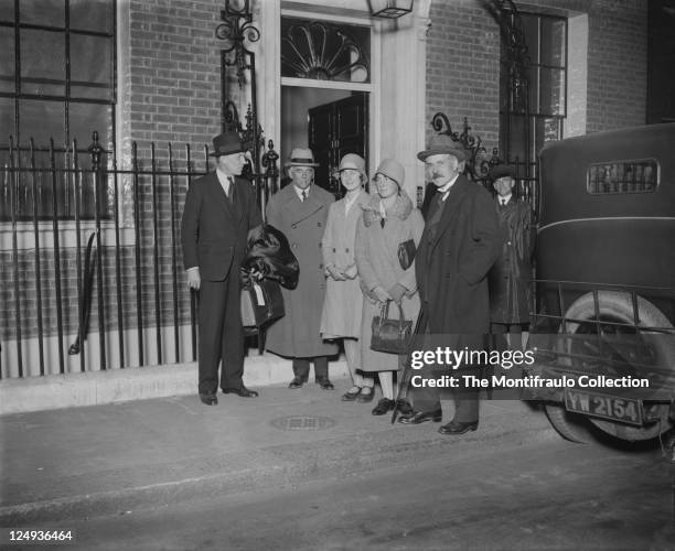 Prime Minister Ramsay MacDonald standing outside 10 Downing Street with his two daughters Sheila and Ishbel and, from left to right Sydney Arnold,...