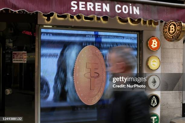 People passing by the Bitcoin office in Istanbul, Turkey on March 24, 2023. Bitcoin, which has reached its highest level in recent months, rose to...