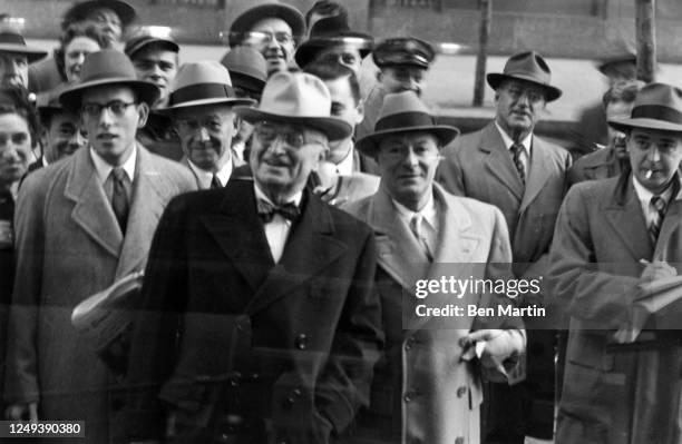 American politician Harry S Truman and American comedian George Jessel appear on the "Today Show" studio monitor peering in at chimpanzee J. Fred...