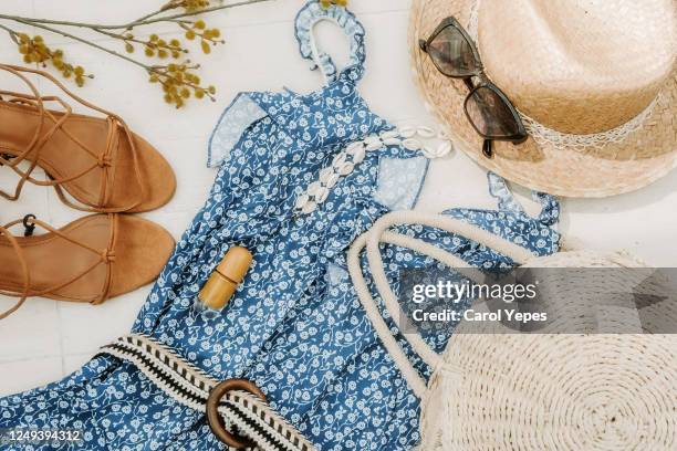 flat lay shot of female holiday clothing and accessories for summer fashion - flatlay fashion stockfoto's en -beelden