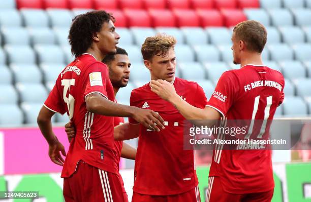 Joshua Zirkzee celebrates his sides first goal with Serge Gnabry, Joshua Kimmich and Mickael Cuisance of Bayern Munich during the Bundesliga match...