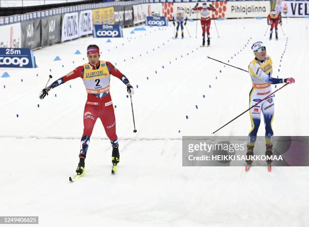 Kristine Stavaas Skistad of Norway wins the race before second-placed Jonna Sundling of Sweden during the women's cross-country skiing classic style...