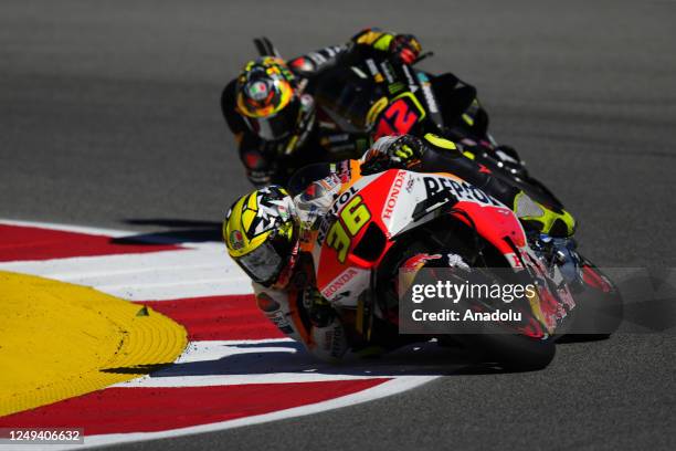 Joan Mir of Spain and Repsol Honda Team Honda and Marco Bezzecchi of Italy and Mooney VR46 Racing Team Ducati compete during the Grande Premio TISSOT...