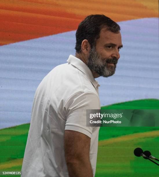 India's main opposition leader of Indian National Congress, Rahul Gandhi, reacts as he arrives in his press conference in New Delhi, India on March...