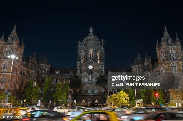 View of the Chhatrapati Shivaji Terminus railway station after the lights were turned off to mark the Earth Hour environmental campaign in Mumbai on...