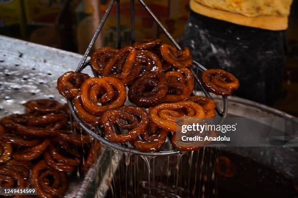 Confectioners continue to work to meet the increasing demands during Ramadan in Mosul, Iraq on March 25, 2023.