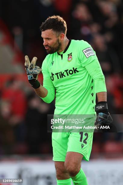 Ben Foster of Wrexham celebrates after his team scored a goal to make it 3-0 during the Vanarama National League match between Wrexham and York City...