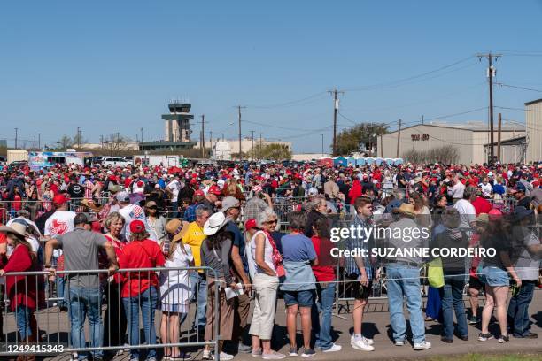 Supporters of former US President Donald Trump arrive for a 2024 election campaign rally in Waco, Texas, March 25, 2023. - Trump held the rally at...