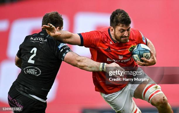 Limerick , Ireland - 25 March 2023; Jean Kleyn of Munster is tackled by Fraser Brown of Glasgow Warriors during the United Rugby Championship match...