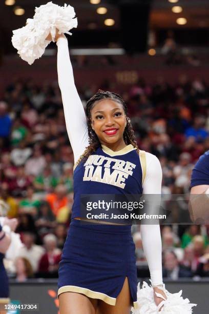 Cheerleader for the Notre Dame Fighting Irish during the Sweet Sixteen round of the 2023 NCAA Womens Basketball Tournament held at Bon Secours...