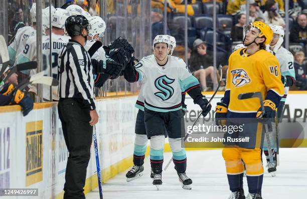 Eeli Tolvanen of the Seattle Kraken celebrates his goal against the Nashville Predators during an NHL game at Bridgestone Arena on March 25, 2023 in...