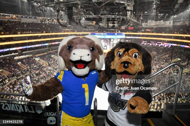 Los Angeles Rams mascot Rampage and Los Angeles Kings mascot Bailey pose for photo during the first period between the Winnipeg Jets and the Los...