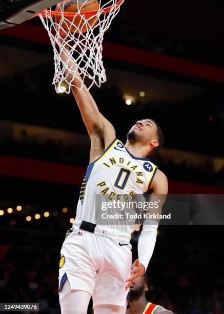 Tyrese Haliburton of the Indiana Pacers goes up for a shot during the first half against the Atlanta Hawks at State Farm Arena on March 25, 2023 in...