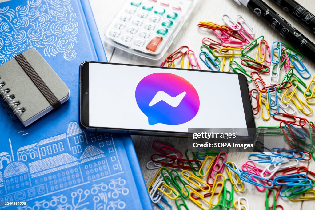Facebook Messenger Graphics In this photo illustration a Facebook Messenger logo seen displayed ...