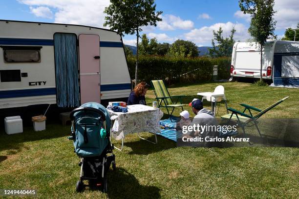 Family enjoys a weekend with their motorhome at the Monte Holiday campsite on June 13, 2020 in Gargantilla de Lozoya y Pinilla de Buitrago, Spain....