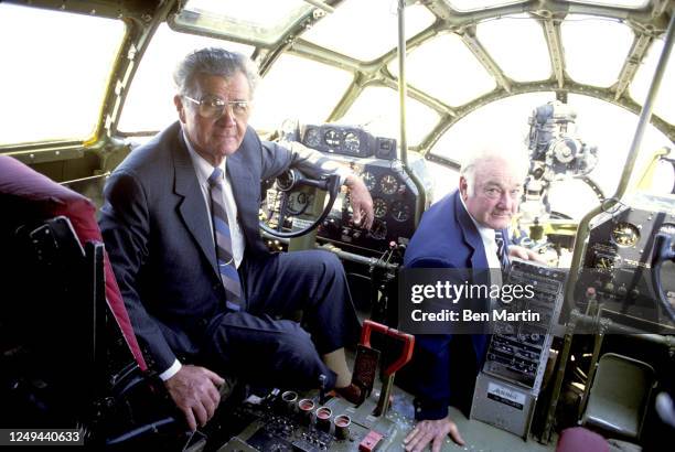 Paul Tibbets , brigadier general in the United States Air Force, and bombardier Tom Ferebee , in the cockpit of the Enola Gay, the Boeing B-29...