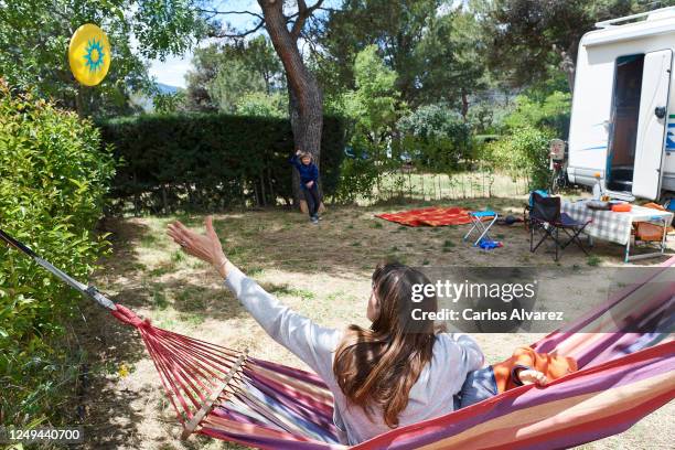 Family enjoys a weekend with their motorhome at the Monte Holiday campsite on June 13, 2020 in Gargantilla de Lozoya y Pinilla de Buitrago, Spain....