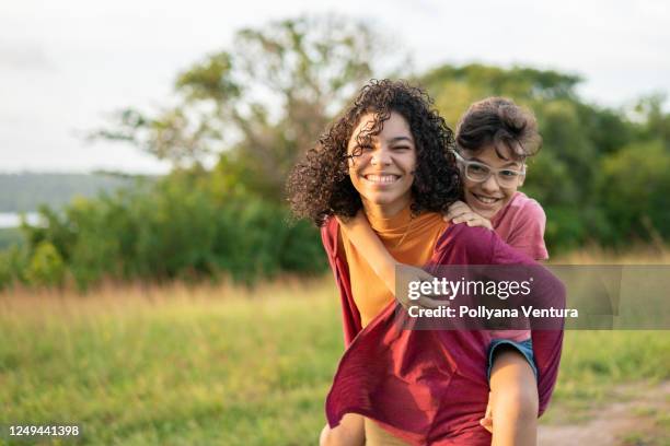 siblings enjoying nature - brother sister stock pictures, royalty-free photos & images