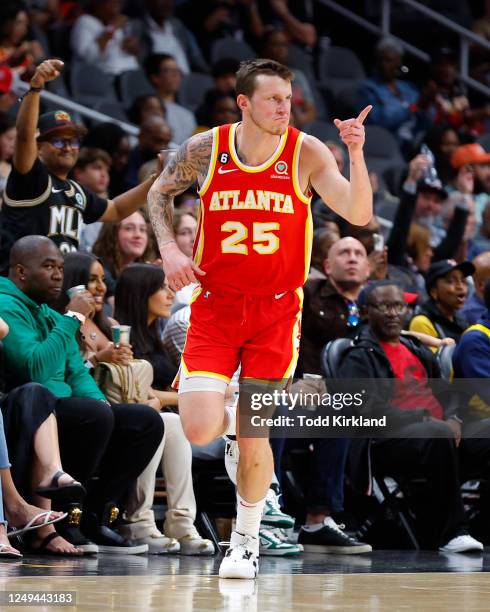 Garrison Mathews of the Atlanta Hawks reacts after a three-point play during the first half against the Indiana Pacers at State Farm Arena on March...