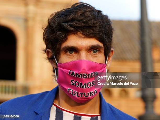French bullfighter Sebastian Castella wearing a face mask that reads, 'We are also culture' joins professionals, amateurs and supporters of...