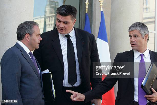 French Labour Minister Xavier Bertrand, France's junior minister for French expatriates David Douillet, and Minister for Higher Education and...