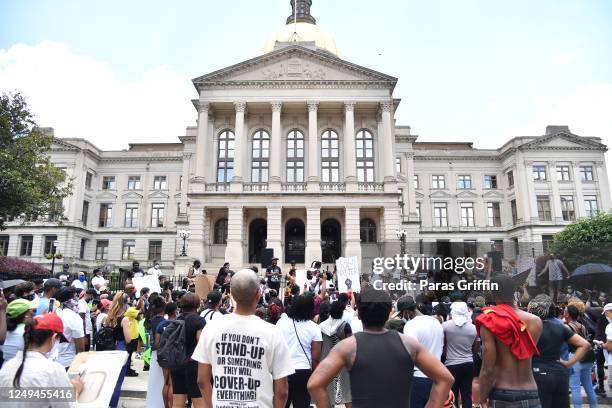 Protesters gather during the Justice For Kendrick Johnson Rally at Georgia State Capitol on June 13, 2020 in Atlanta, Georgia. The recent protests...