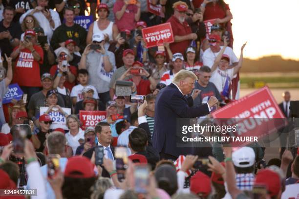 Former US President Donald Trump dances off the stage at the conclusion of a 2024 election campaign rally in Waco, Texas, March 25, 2023. - Trump...