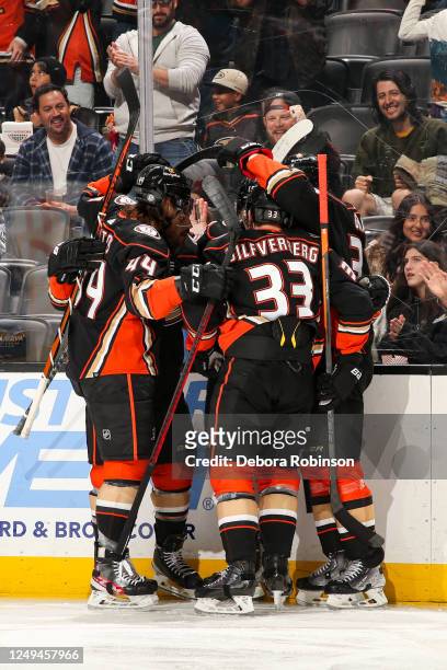 Troy Terry of the Anaheim Ducks celebrates his goal with teammates during the first period against the St. Louis Blues at Honda Center on March 25,...