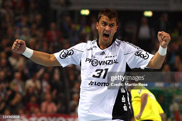 Momir Ilic of Kiel celebrates after scoring during the Toyota Handball Bundesliga match between THW Kiel and Frisch Auf Goeppingen at the Sparkassen...